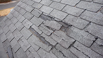 Cracked roof shingles