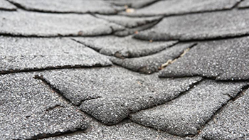 Worn and tired roof shingles