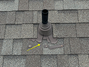 damaged and old roof plumbing boot fixture needs replacement